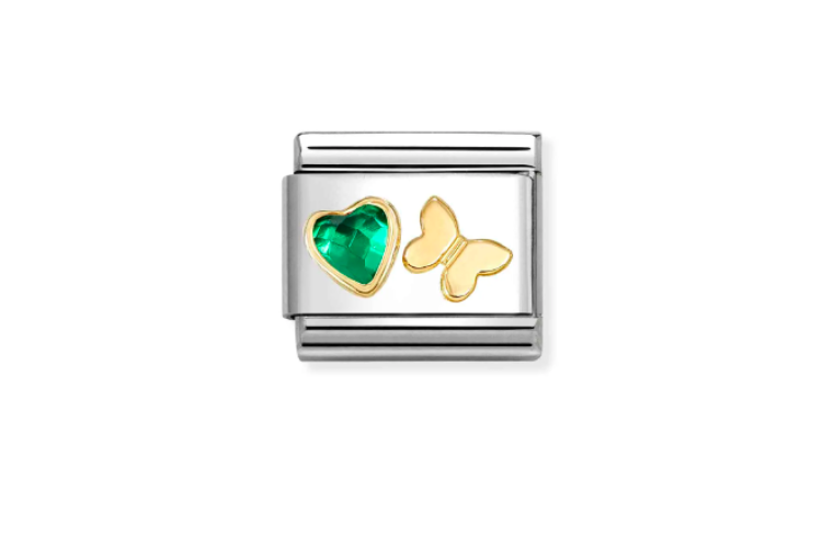 green heart stone with butterfly